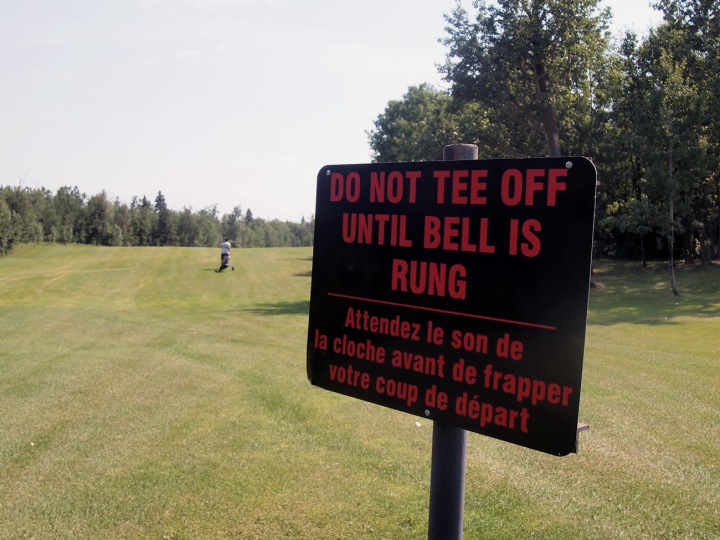 This sign on the first fairway is a good indication of what is to come — lots of hills, and more than a few blind holes.
